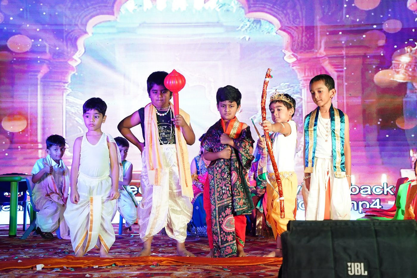 Little Ville students staging a mythology drama in costume at Annual Day 2025-26