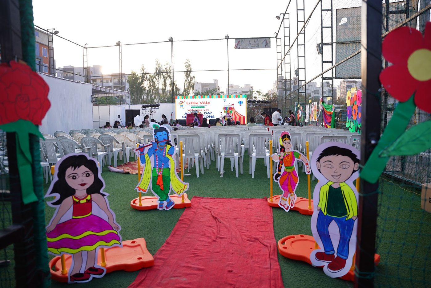 The decorated red-carpet entrance and seating set up for Little Ville Annual Day 2025-26